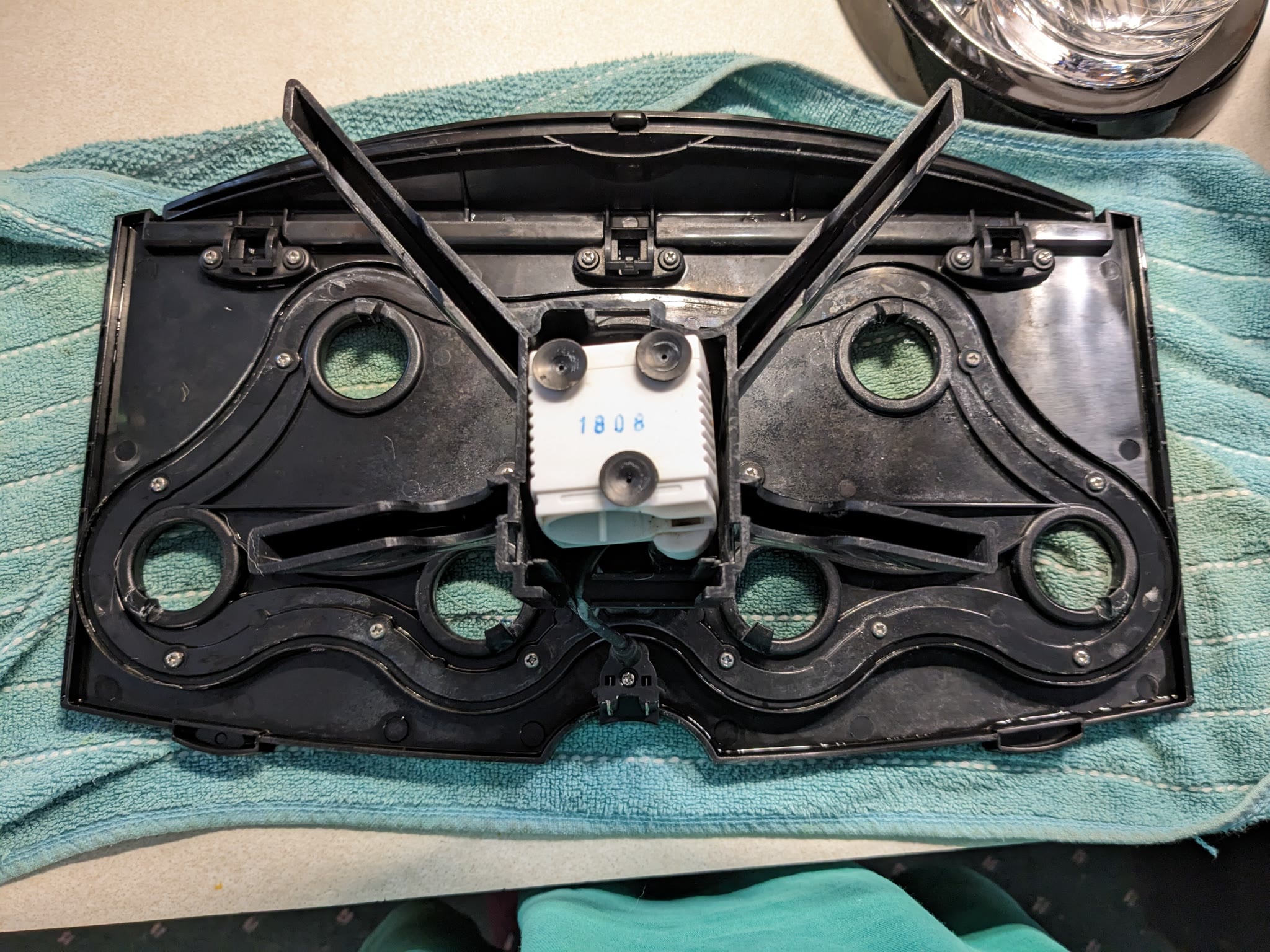 Update #5: Step 9: Putting the pump back in.The cord tucks underneath the pump a bit, then you just wiggle the tube back on…